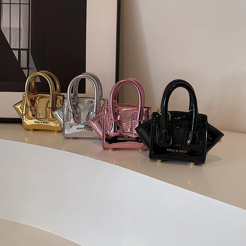 Trendy mini-oortelefoontas Cro - Embroidery Bag recensie en prijs